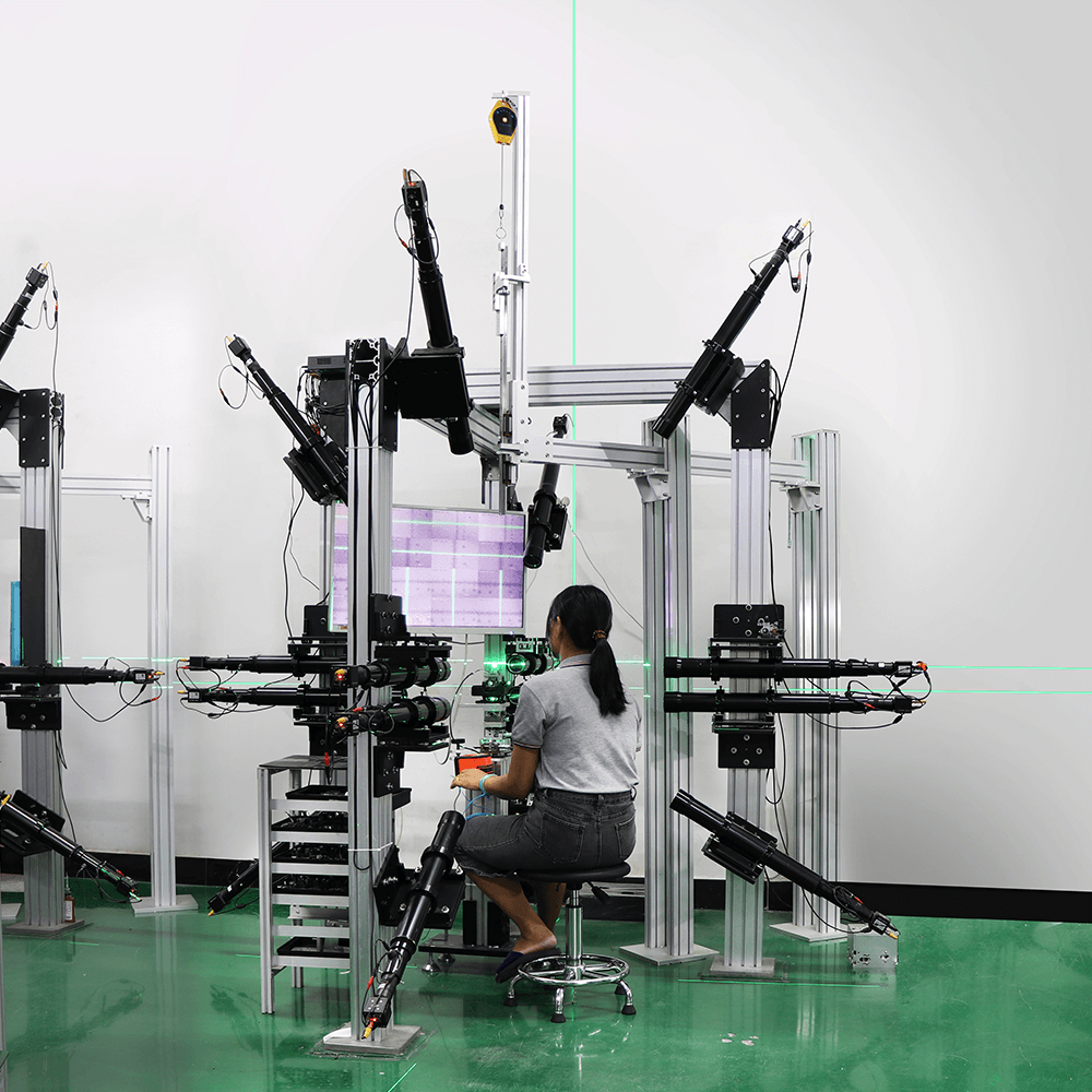 Dovoh staff is using a professional machine to calibrate the laser level accuracy.