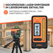 DOVOH laser receiver and laser level on a construction site background